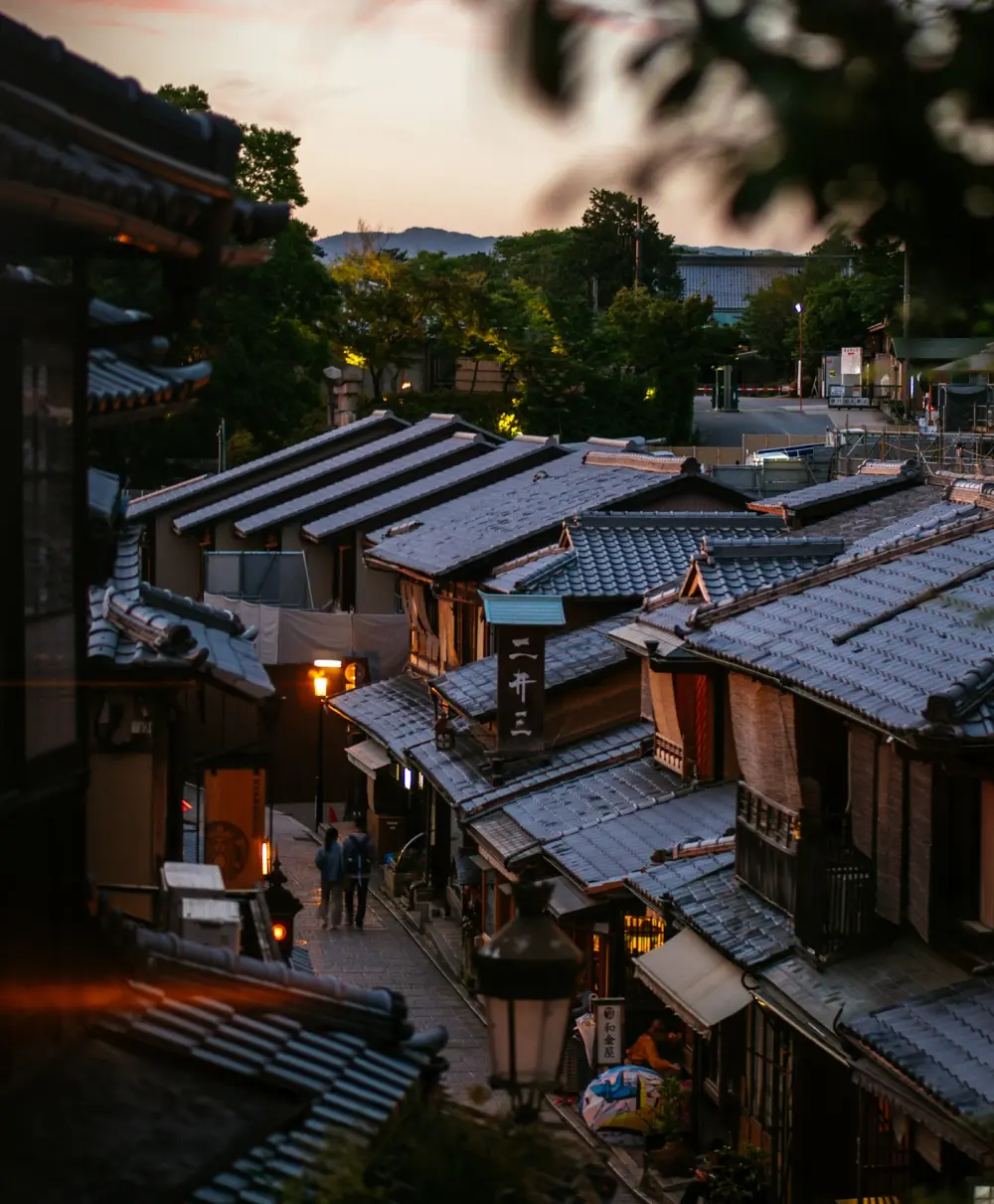 Traditional wooden buildings and trees in Gion, Kyoto